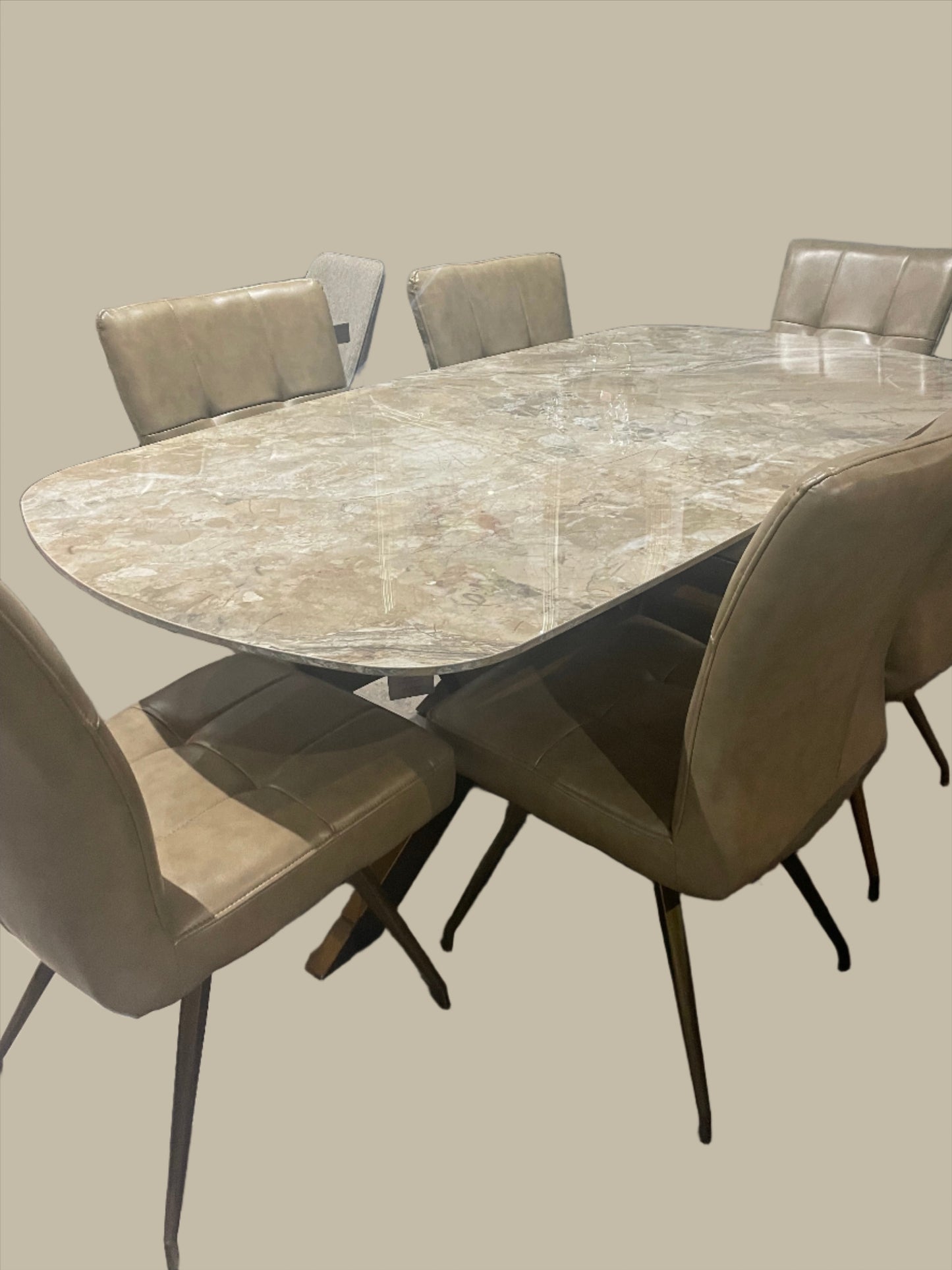 Sammy Marble look Large dining table with brass spider leg discontinued ?