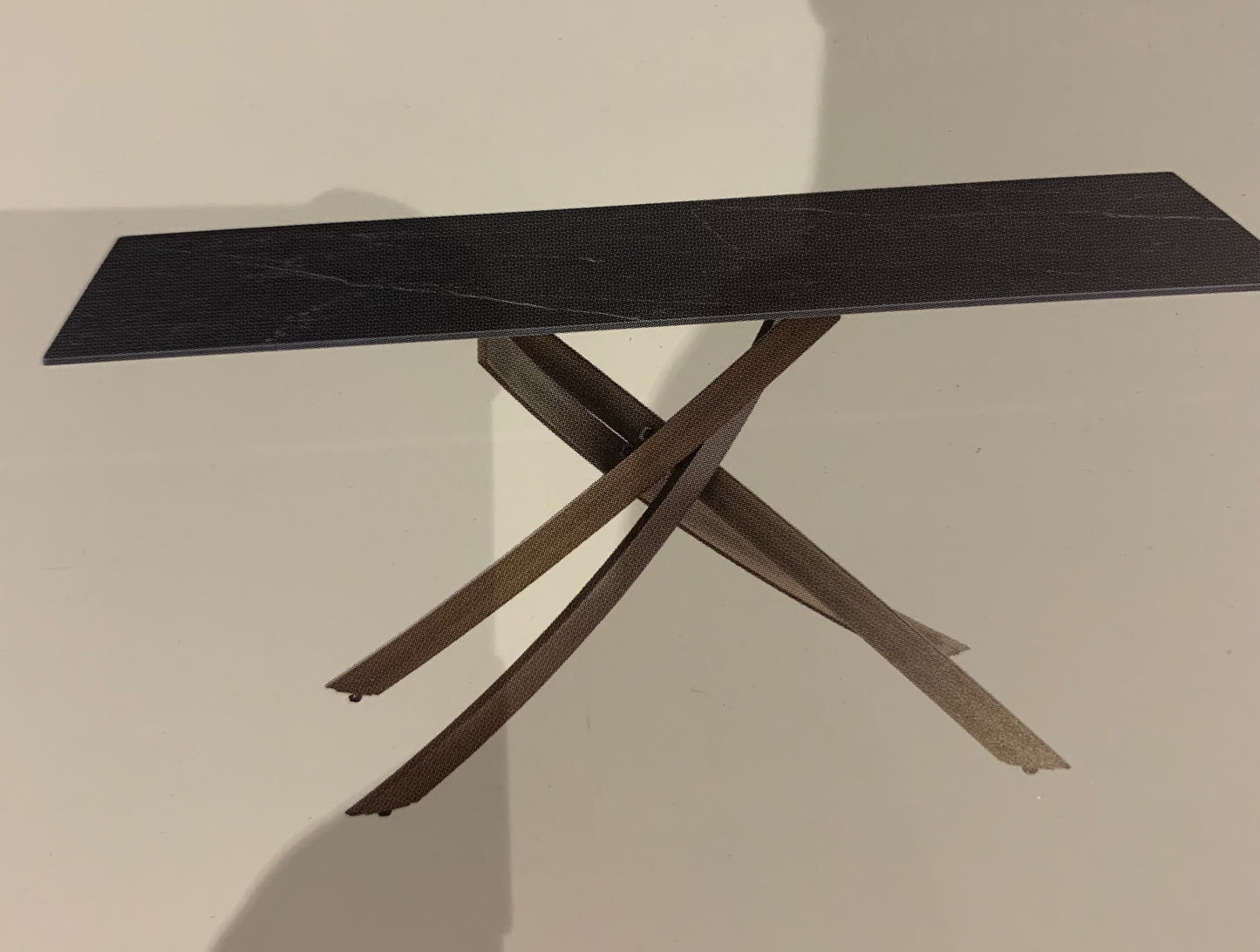 Berkeley 1.8 black Matt black sinterex stone top table with brushed brass spider leg