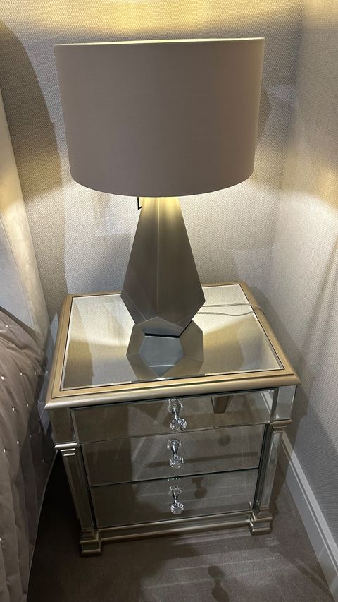 Appian Apollo 3 drawer bedside cabinet with champagne trim 40% off . purchase in store only