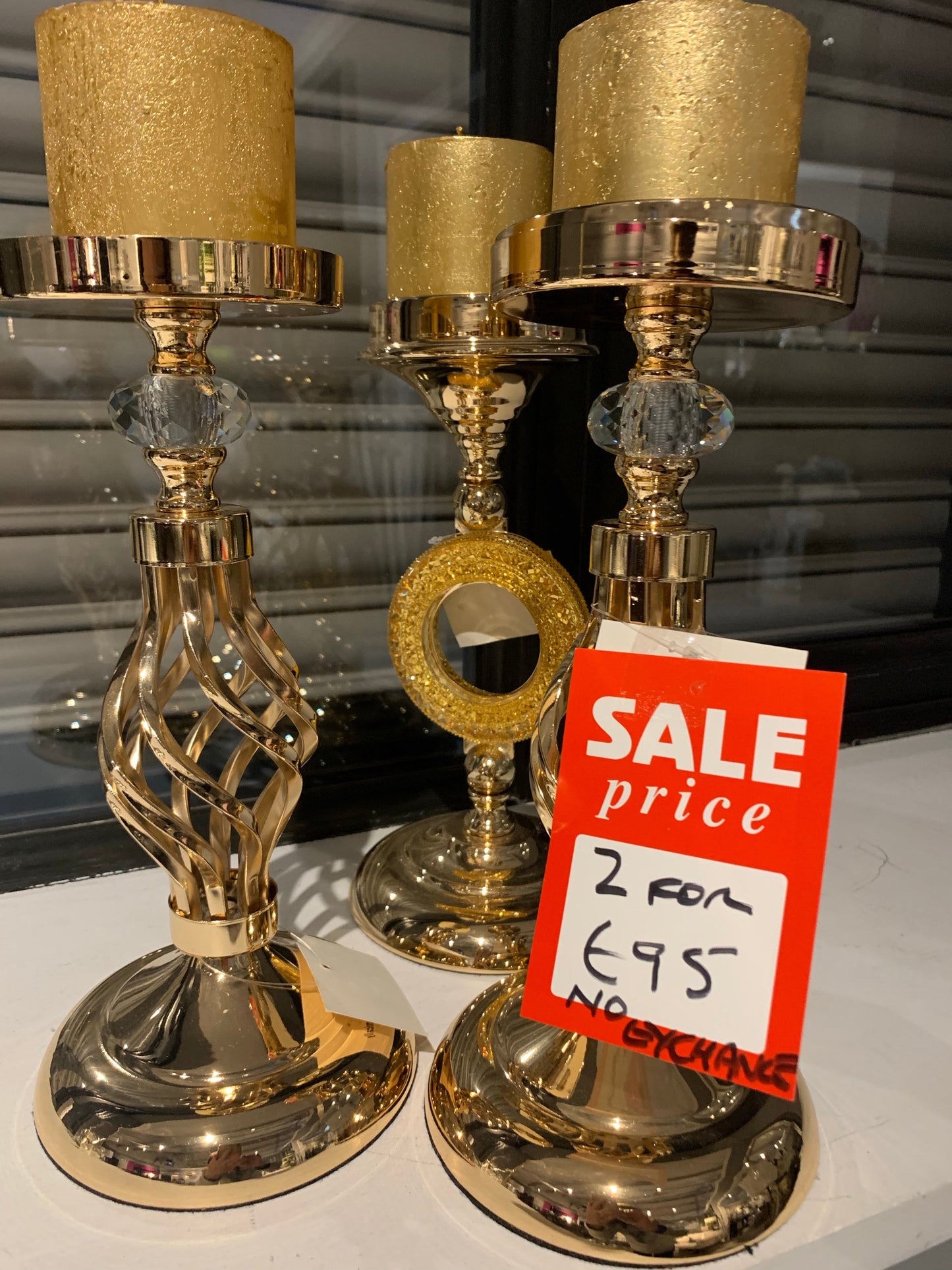 Candle holder with centre ring in gold Instore clearance