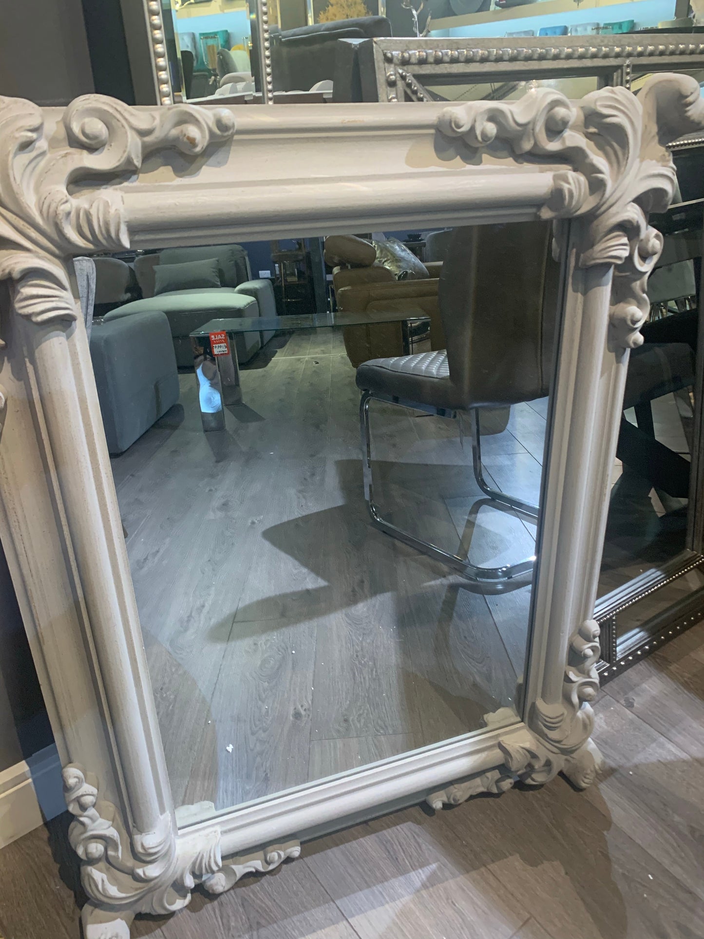 Taupe French style mirror with corner detail check availabiliy