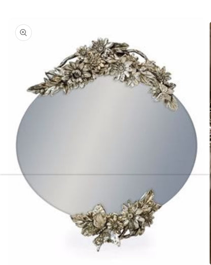 Oval frameless mirror with double butterfly  detail collect only or arrange delivery