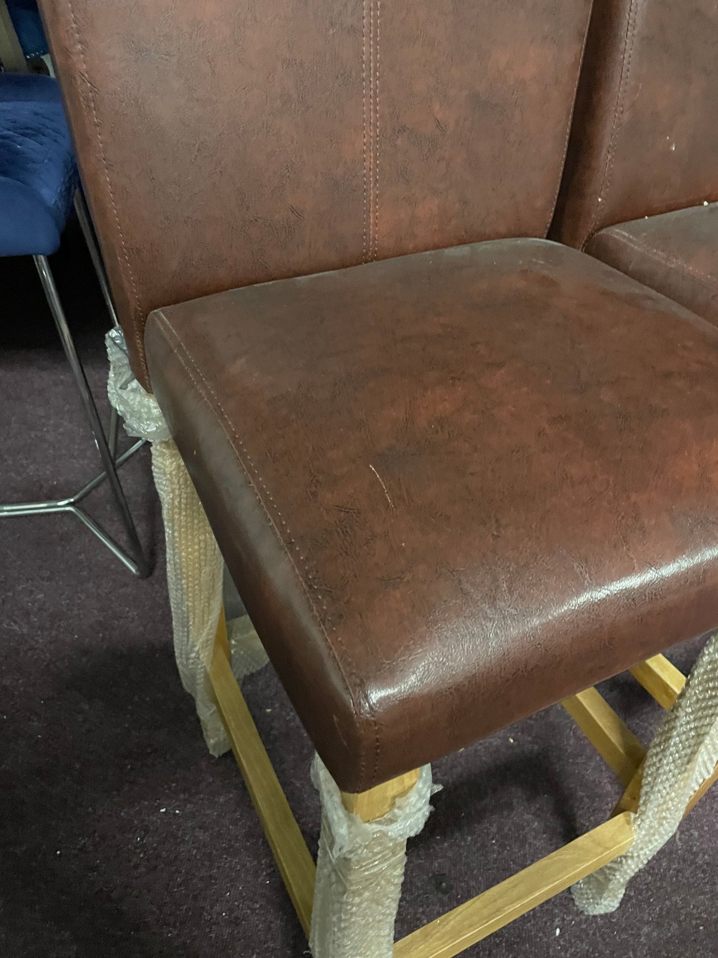 2 leather and oak colour bar stools Ex display  unwrapped so for collection only