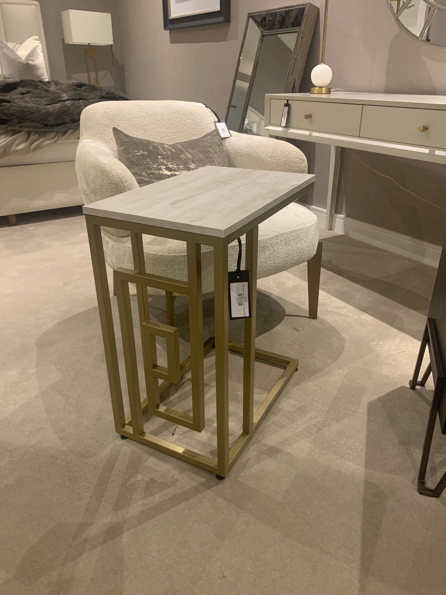 Dillon sofa table in gold and cream online or in store