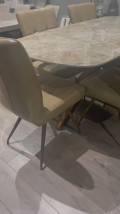 Sammy Marble look Large dining table with brass spider leg discontinued ?