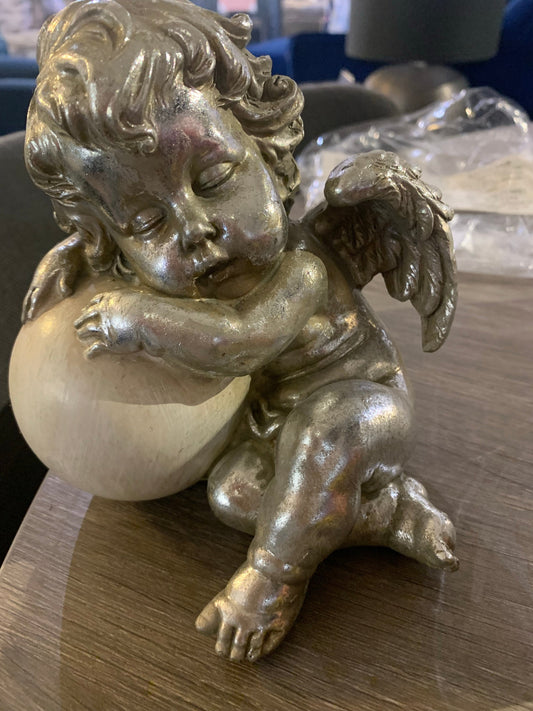 Cherub and white orb click n collect