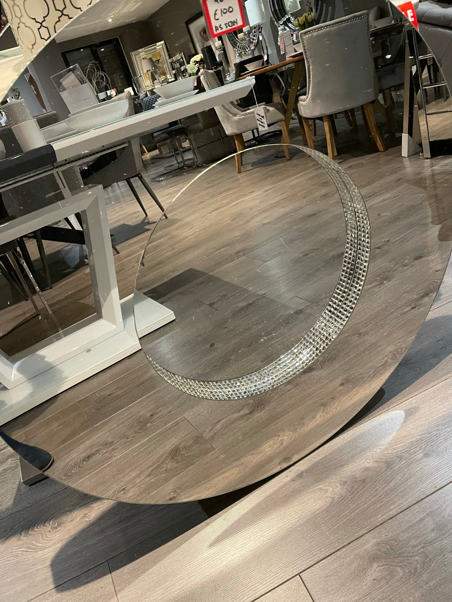 Stunning large round frameless mirror with diamonte profile.  Outlet store