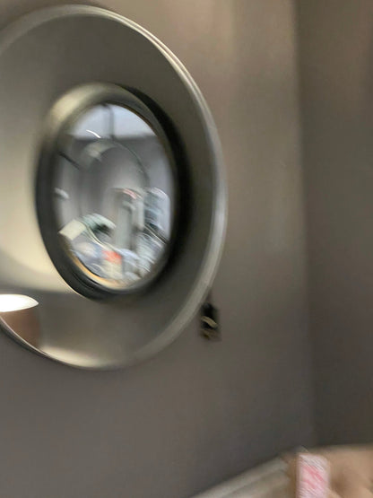 Burnished silver foil round window mirror 93 cm ex display
