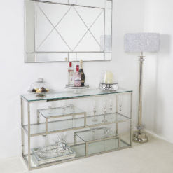 Harry chrome and glass console table with tiered shelf.